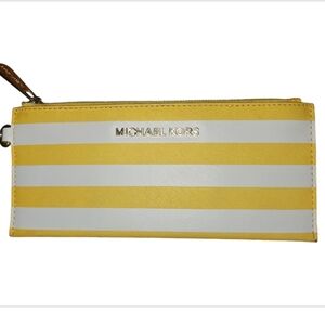 Michael Kors wristlet strap is missing. EUC 8.5x4.5" Yellow and white striped